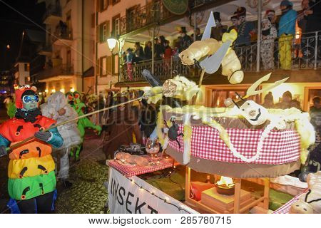 Participants In Costumes Perform A Street Procession At The Carnival