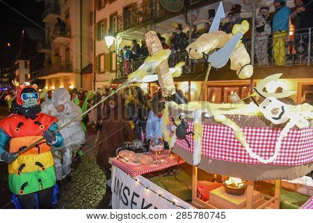 Participants In Costumes Perform A Street Procession At The Carnival