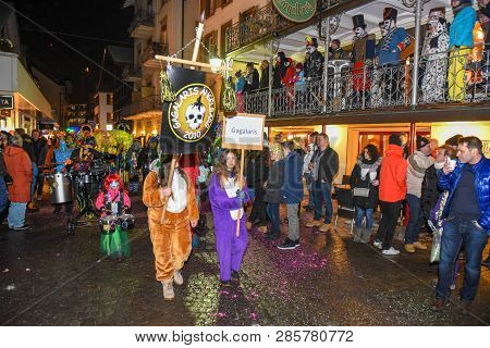 Participants In Costumes Perform A Street Procession At The Carnival