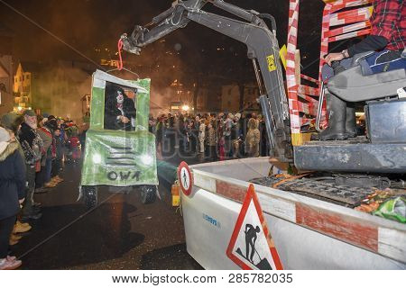 Participants In Costumes Perform A Street Procession At The Carnival