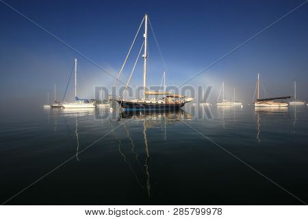 Bright Fogbow Over The Sailboats Anchored Off Crandon Marina In Key Biscayne, Florida, On A Calm, Fo
