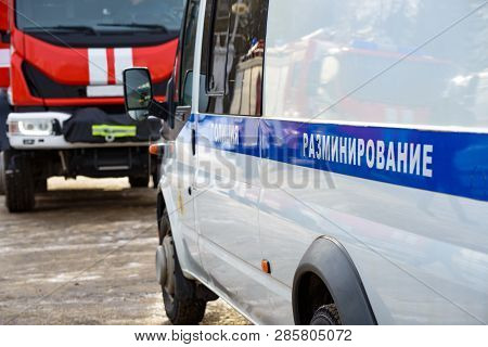 Car Special Services With The Inscription Demining