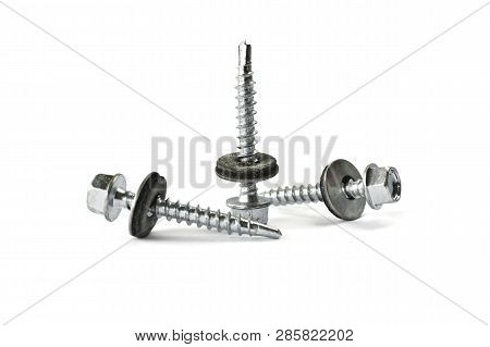 Closeup Self Drilling Screws For Roofing With A Drill And With Sealing Washer Isolated On White. Iso