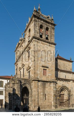 Braga, Portugal - Circa February 2019: Braga Cathedral With Its Gothic Bell Towers. Se De Braga Is T