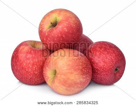 Pile Of Pink Lady Apple Isolated On White Background