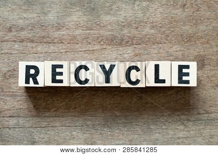 Letter Block In Word Recycle On Wood Background