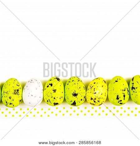 Easter Abstract Gift Card On White Textured Background With Easter Eggs Laying In Row