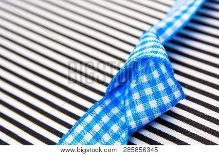 Gift Card Textured Background With Blue Bow In The Middle And Black Lines With Plenty Copy Space For