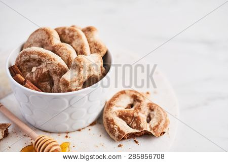 Traditional Chtristmas Gingerbread Cookies Made Of Ginger, Honey And Cinnamon With Icing In White Bo