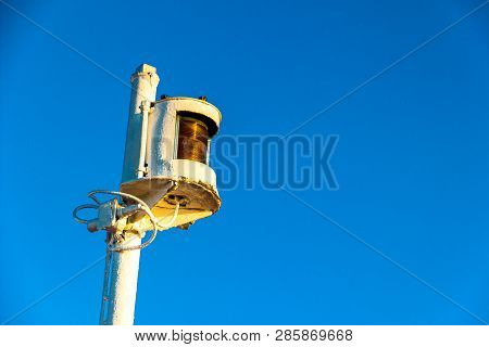 Isolated Navigation Light With Blue Sky On The Background