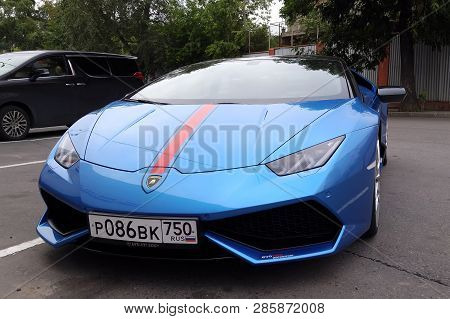 Moscow. Autumn 2018. Bright Blue Lamborghini Huracan Parked On The Street. With Red Stripe On A Car 