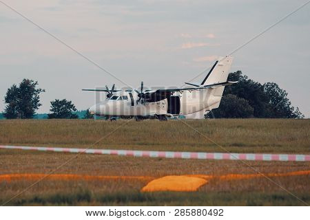 Parachutist Aircraft On Land
