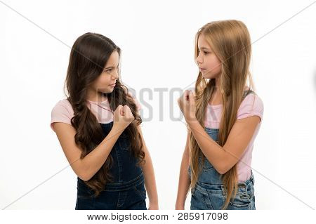 Who Is The Most Beautiful. Small Girls With Long Hairstyle Showing Their Fists. Kids Hair Care And G