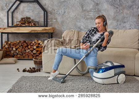 Full Length Portrait Of Cheerful Young Woman 20s Listening To Music Via Headphones And Having Fun Wi