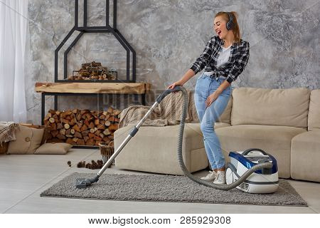 Full Length Portrait Of Cheerful Young Woman 20s Listening To Music Via Headphones And Having Fun Wi
