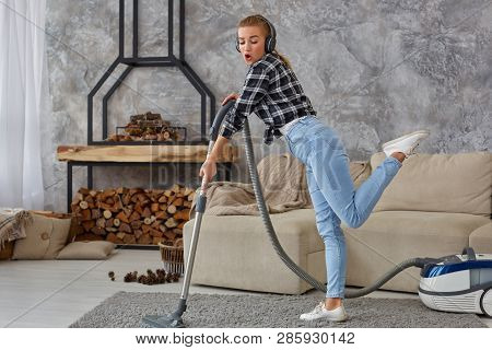 Full Length Portrait Of Cheerful Young Woman 20s Listening To Music Via Headphones And Having Fun Wi