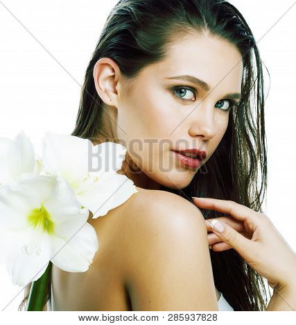 Young Pretty Woman With  Amarilis Flower Close Up Isolated On White