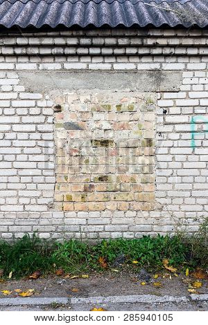Old Gungy White Brick Wall With Bricked Up Window