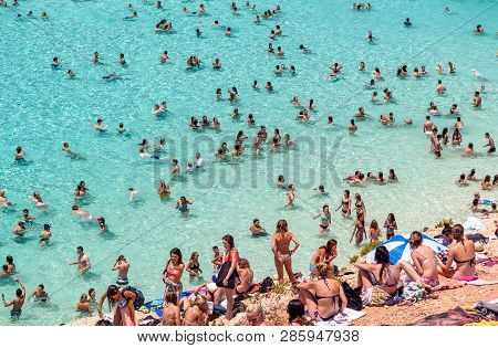 Comino, Malta - July 16: Sunbathing At  Blue Lagoon At Island Comino - Malta On July 16, 2015 In Com