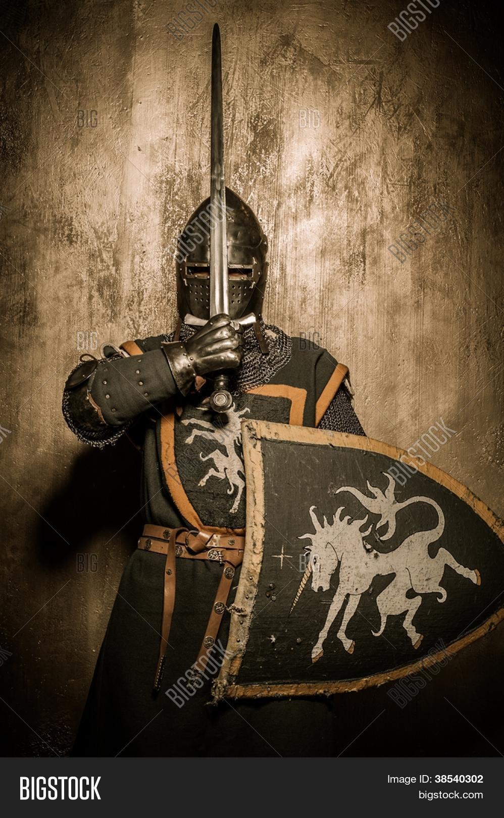 Medieval Knight Holding Sword Front Image & Photo Bigstock