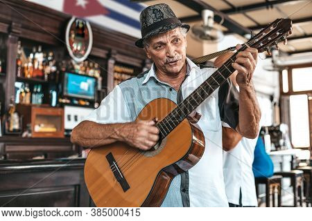 Havana, Cuba - October 18, 2019: Cuban Band Performing Live Music In A Bar (dos Hermanos) In Havana,