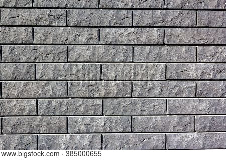 Grey Wall Tiles Imitating Brickwork. Modern Finishing Material. Gray Facade Facing Tiles, Imitating 
