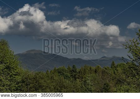 Big Mountains In Poland Near Cisna Town In Blue Sky Summer Day