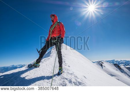 Last Steps Before Mont Blanc (monte Bianco) Summit 4,808 M Of Man With Climbing Axe Dressed Mountain