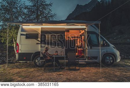 Caucasian Men In His 40s Working Online While On Vacation In Mountain Region. Remote Work On Laptop 