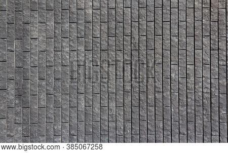 Grey Wall Tiles Imitating Brickwork. Modern Finishing Material. Gray Facade Facing Tiles, Imitating 