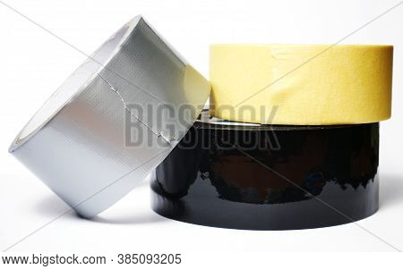 Set Of Various Isolated Adhesive Tapes On A White Background. Gray Reinforced Adhesive Tape, Mountin