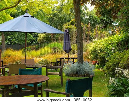 Dining Table In Sunny Garden