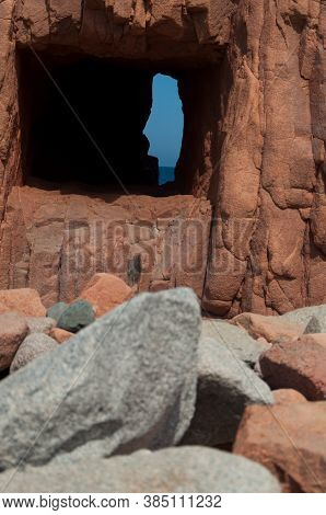 Sardinia Coastline: Typical Red Rocks And Cliffs Near Sea In Arbatax; Italy