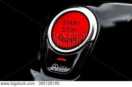 Car Dashboard With Focus On Red Engine Start Stop Button. Modern Car Interior Details. Start/stop Bu