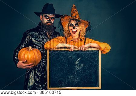 Best Ideas For Halloween. Halloween Couple. Cute Man And Woman Wearing Halloween Clothes. Party And 