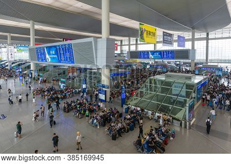 Chengdu, China - Aug 30, 2019: Passengers In Chengdu East Railway Station In China. It Is A Major Ra