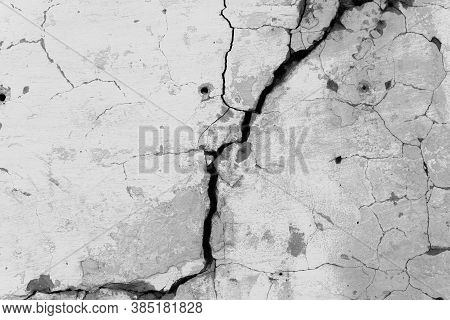 Crack In The White Wall. The Concept Of Schism Or Contradiction.