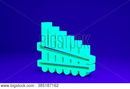 Green Pan Flute Icon Isolated On Blue Background. Traditional Peruvian Musical Instrument. Zampona. 