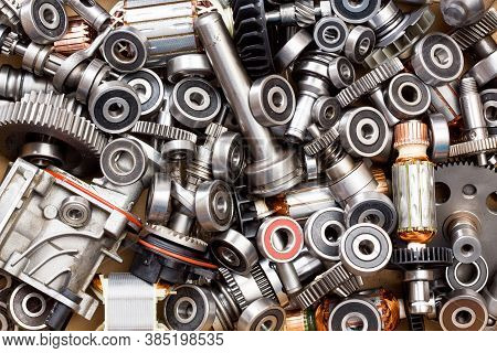 Many Old Metalic Bearings On Background Form.