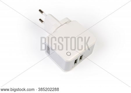Ac Adaptor For Mobile Equipment Battery Charging With Ac Plug Europlug And Two Output Usb Ports On A