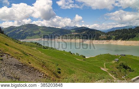 Weir And Lake Of Roselend, In French Alps