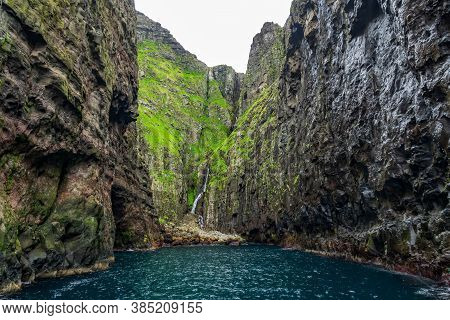 Gloomy Cliffs Near The Ocean In Vestmanna