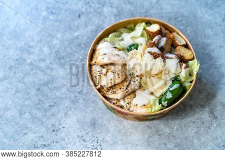 Take Away Healthy Organic Ceaser Salad With Chicken, Parmesan Cheese, Crouton Bread And Yogurt Mayon
