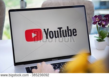 Alanya, Turkey - June 6, 2020: Woman Hand Apple Macbook Pro 16 With App Youtube Provides Streaming M
