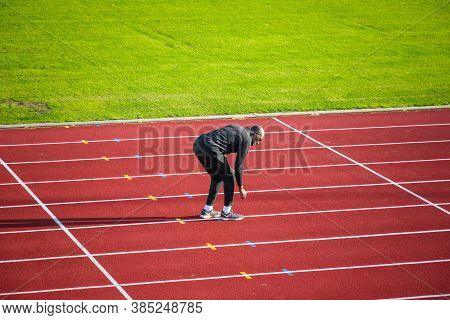 London, Uk - October 5, 2019 - An Athlete Warming Up For Running Practice At The Parliament Hill Fie