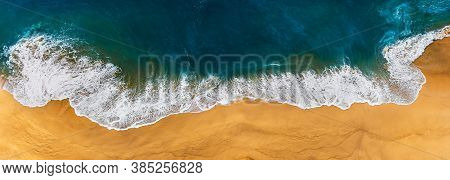 Panorama Of A Clean Beach. Aerial Photography Of A Clean Sandy Beach. Beautiful Beach With Yellow Sa