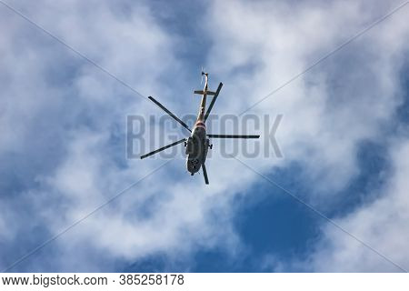 Mi-8 Helicopter Emercom Of Russia In The Sky. View From The Ground