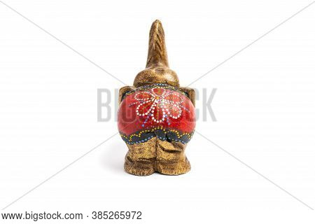 Figurine Of A Wooden Elephant With Pattern On The Back Isolated On White Background. Decorative Figu