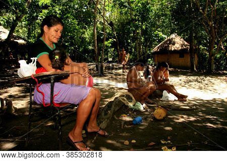 Porto Seguro, Bahia / Brazil - April 14, 2009: Pataxo Indians Are Seen In The Village Jaqueira In Th