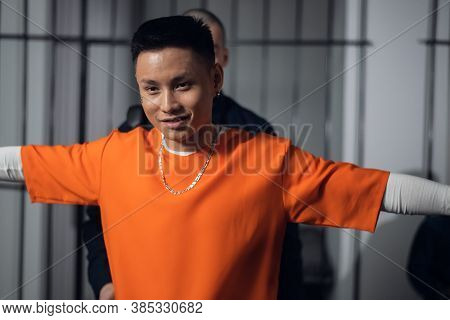 The Superintendent Of A High-security Prison Takes A Prisoner Out Of A Solitary Cell For A Walk